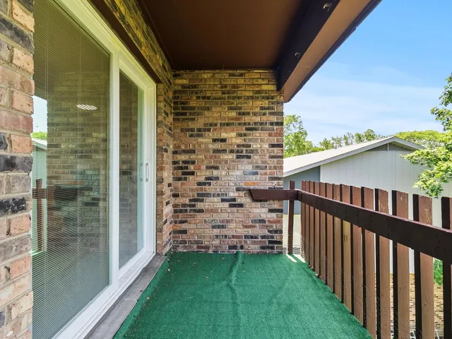 a view of a porch with a yard