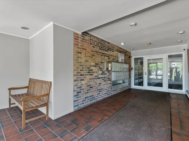a view of livingroom with window and hardwood floor