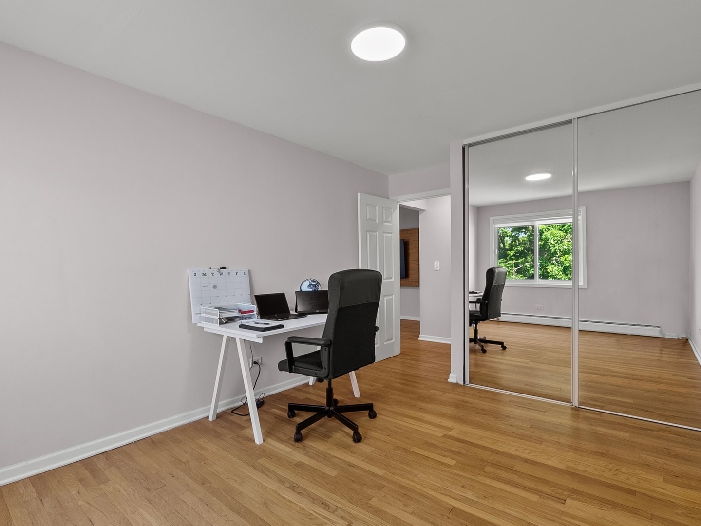 940 East Old Willow Road, Unit 305 Prospect Heights, IL 60070 - Photo 8 of 18 a workspace with furniture and a window