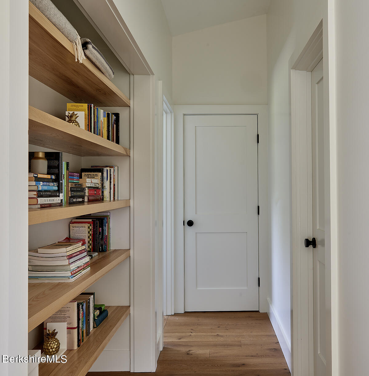 776 Bancroft Road Becket, MA 01223 - Photo 26 of 40 a view of walk in closet with clothes and shoes