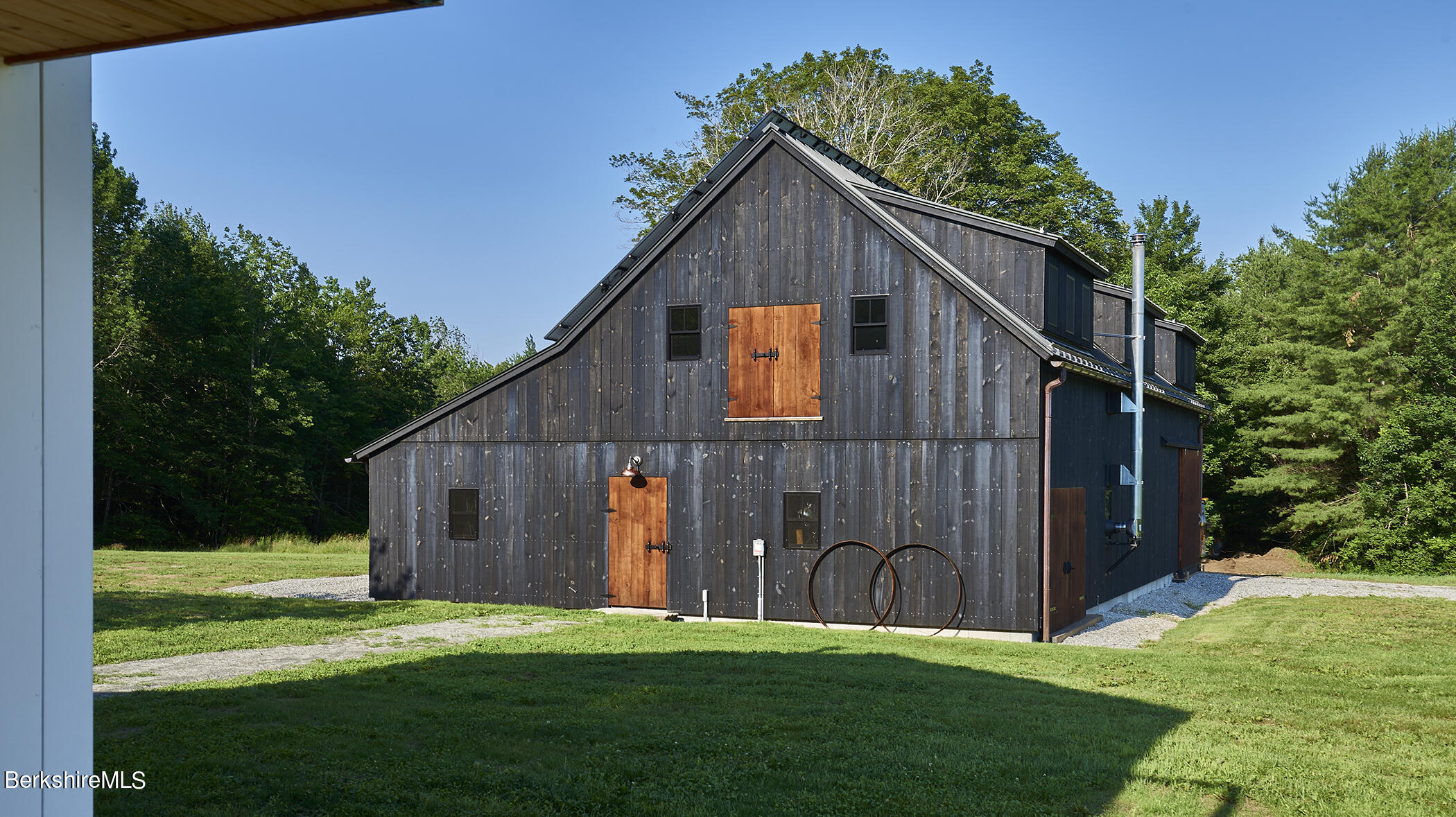 776 Bancroft Road Becket, MA 01223 - Photo 30 of 40 a view of an house with backyard space and garden