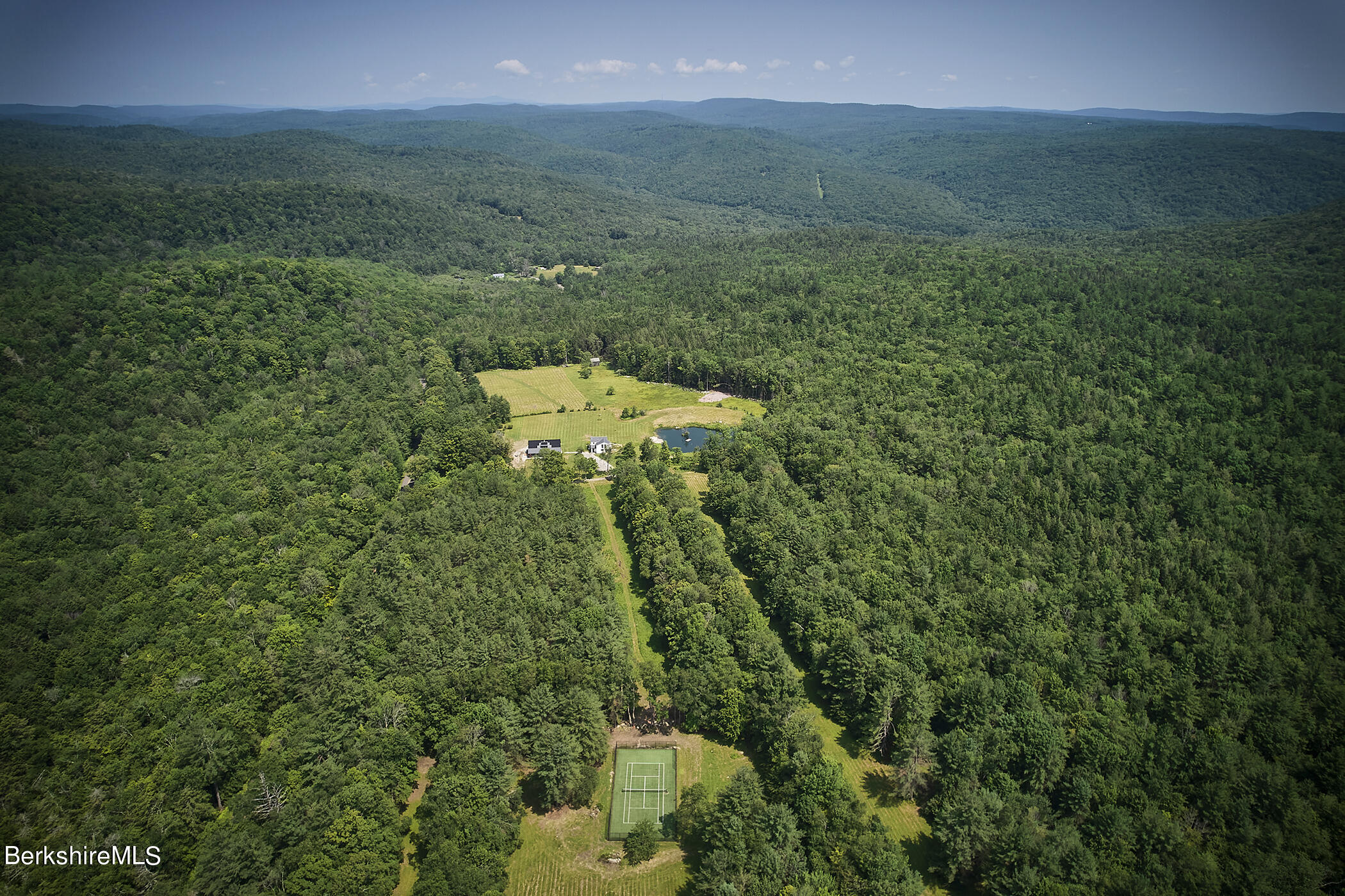 776 Bancroft Road Becket, MA 01223 - Photo 40 of 40 a view of a forest with a street