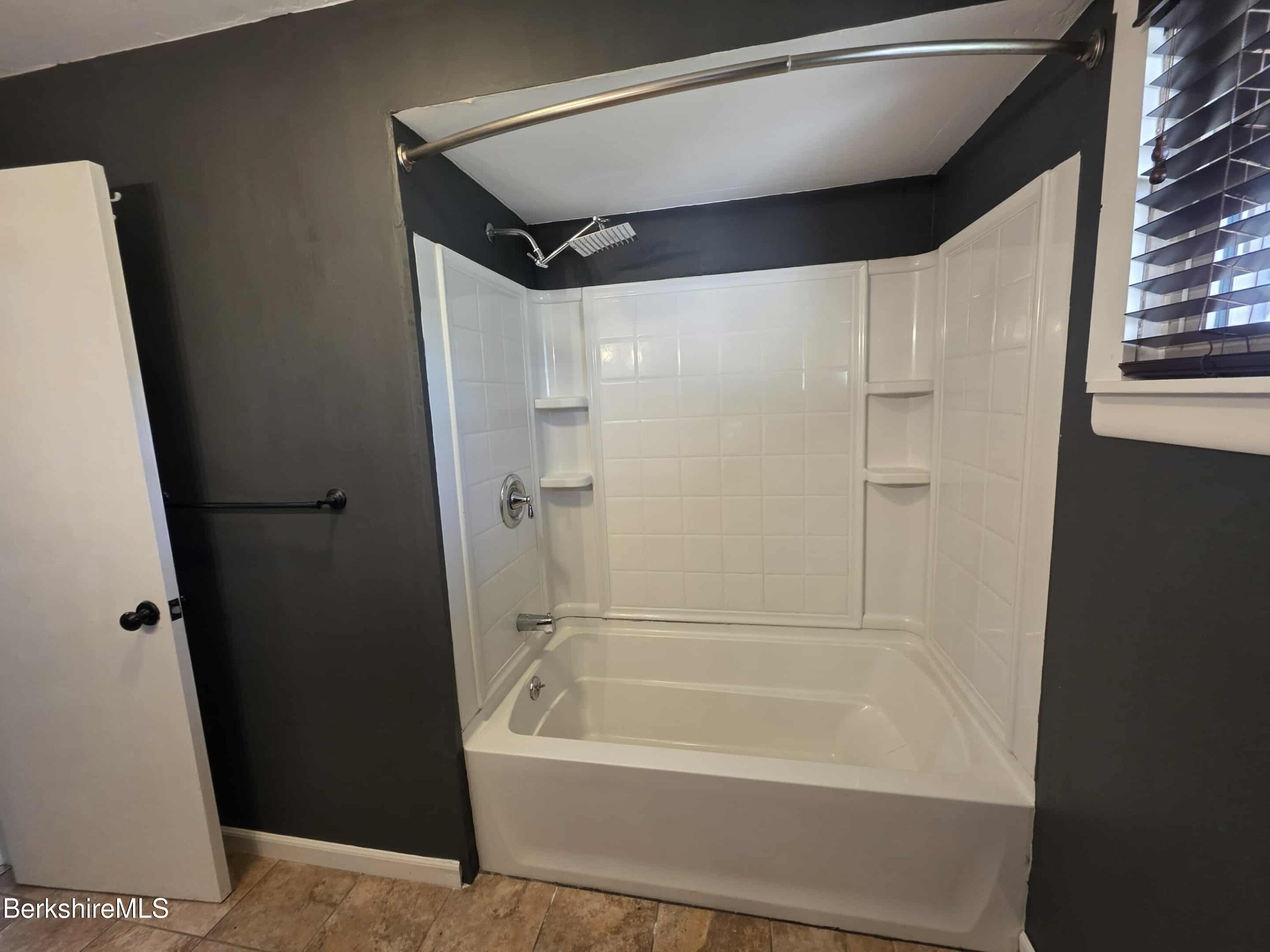 52 Richmond Street Adams, MA 01220 - Photo 15 of 25 a bathroom with a bathtub and a shower