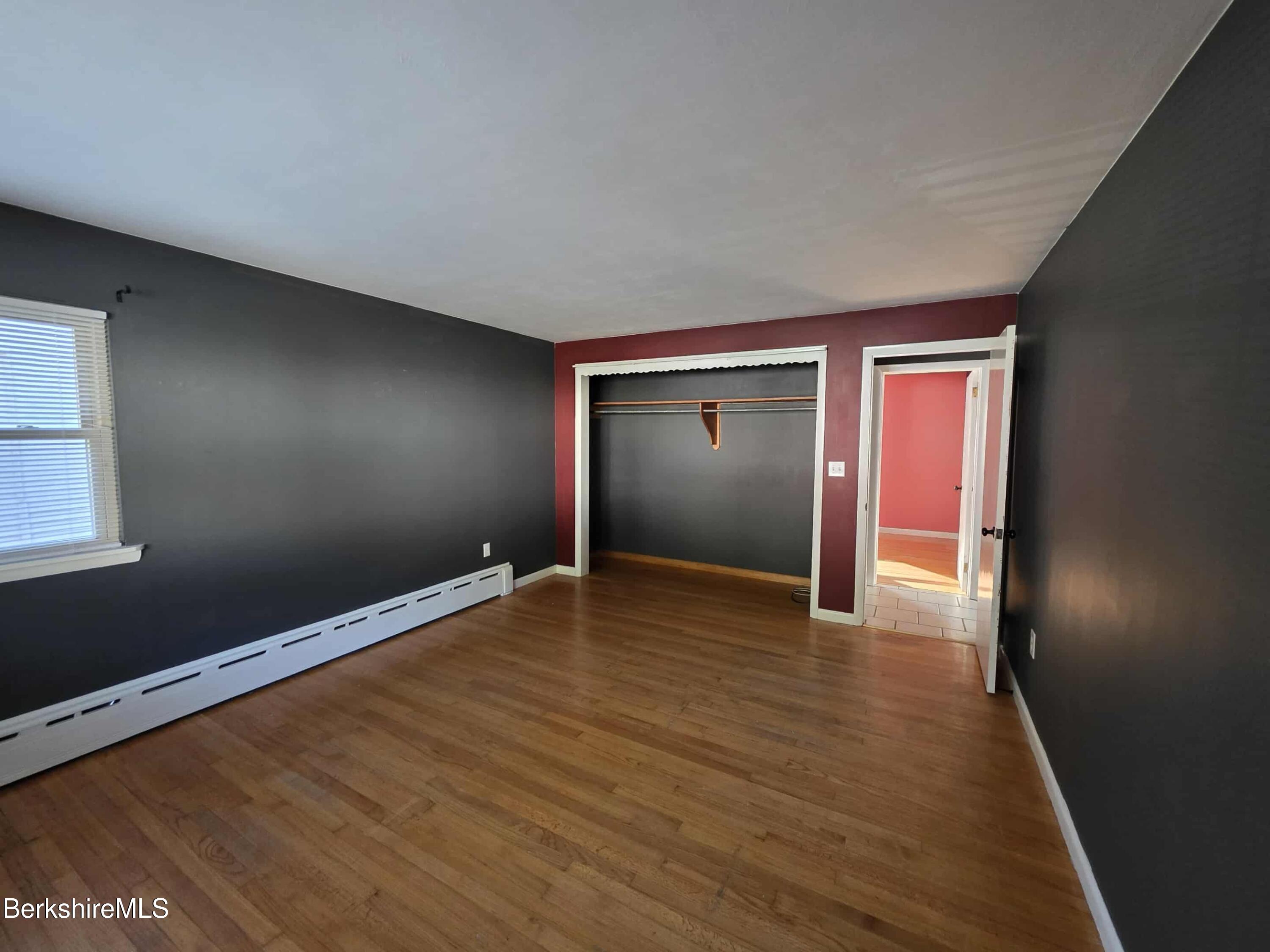 52 Richmond Street Adams, MA 01220 - Photo 18 of 25 a view of empty room with wooden floor