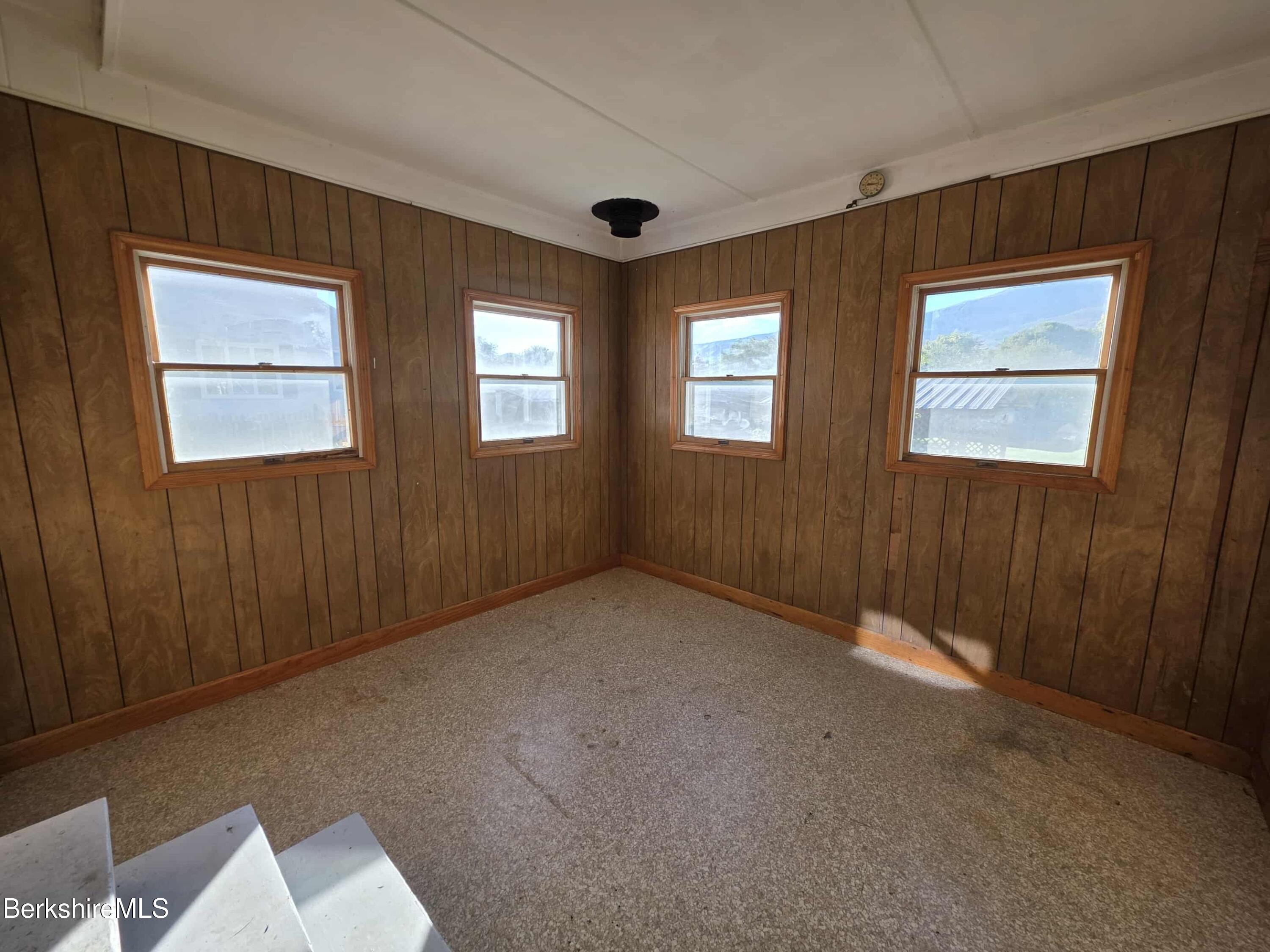 52 Richmond Street Adams, MA 01220 - Photo 21 of 25 a view of an empty room with windows