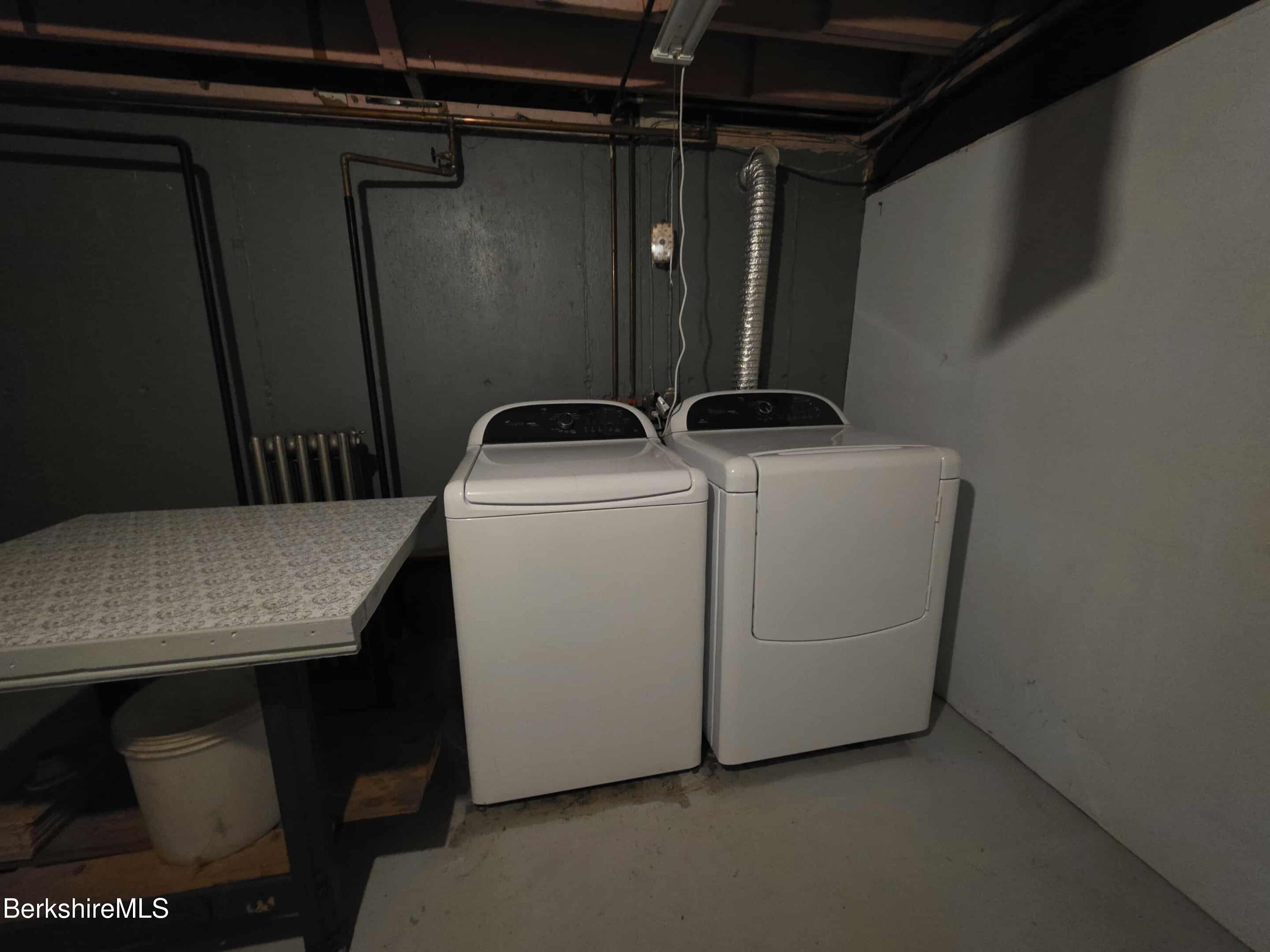 52 Richmond Street Adams, MA 01220 - Photo 22 of 25 a utility room with dryer and washer