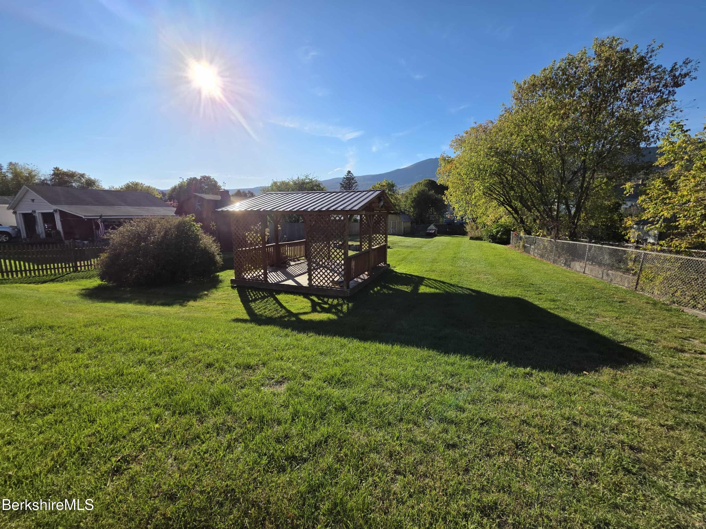 52 Richmond Street Adams, MA 01220 - Photo 3 of 25 a view of a garden with a house