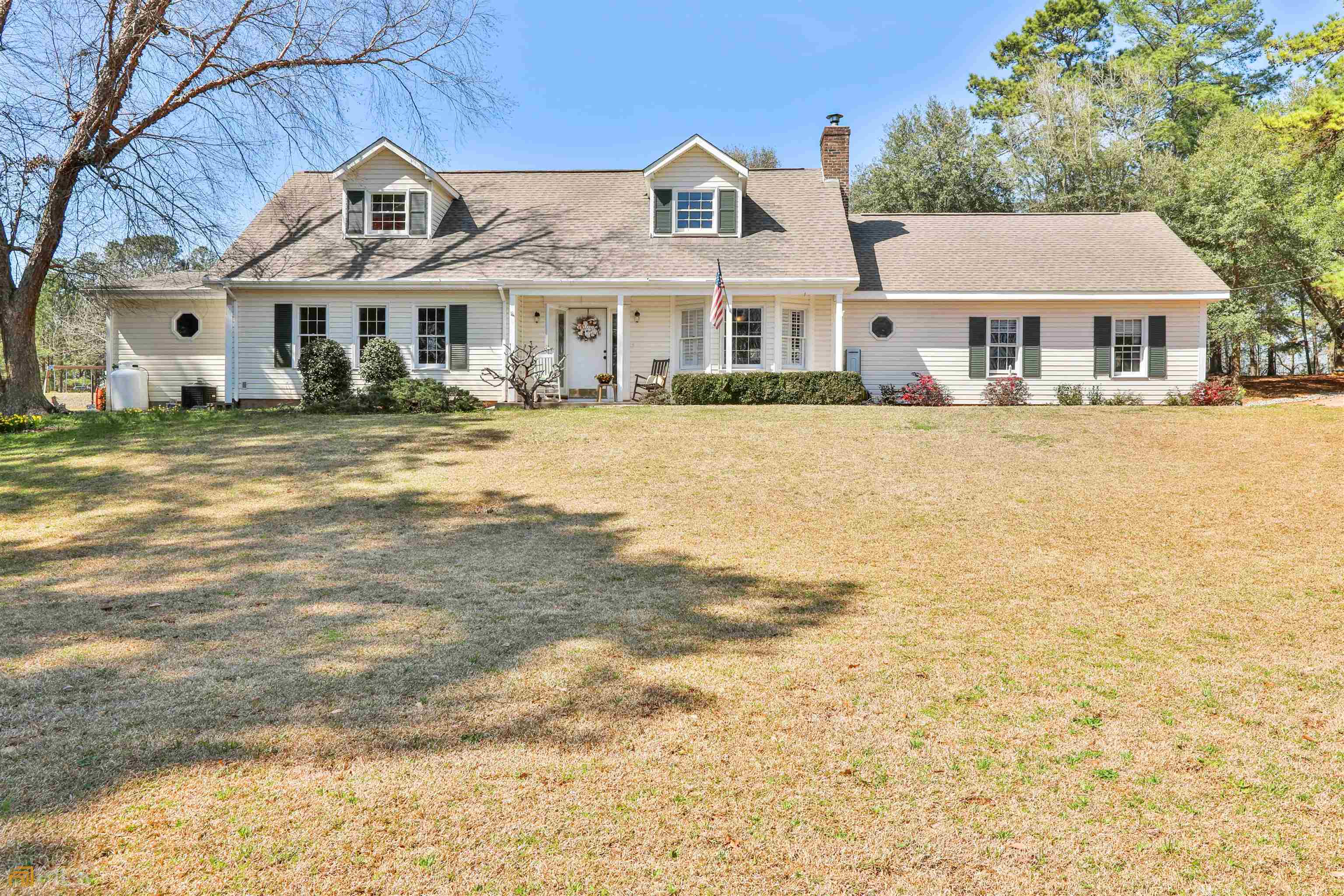 120 South Smith Road LaGrange, GA 30241 - Photo 1 of 1 a front view of a residential houses with yard and swimming pool