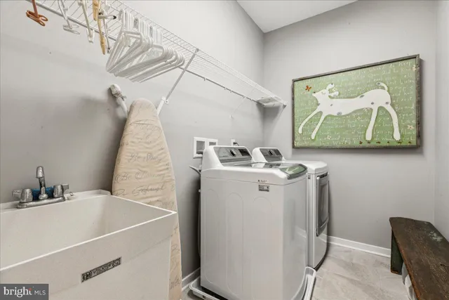 a utility room with a washer and dryer