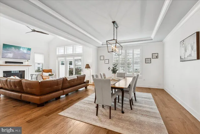 a view of a livingroom with furniture window and wooden floor