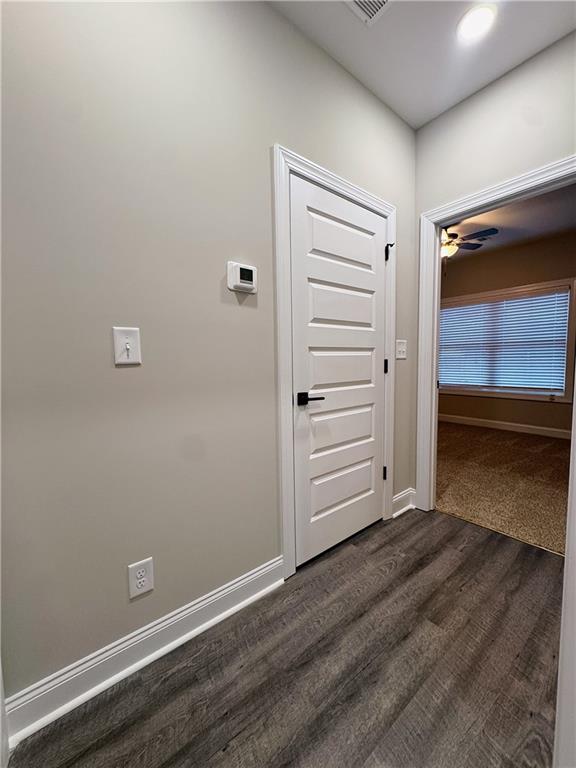 7217 King Road Valley, AL 36854 - Photo 12 of 14 Hall with baseboards and dark wood finished floors