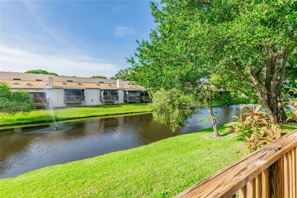 a view of a house with a lake view