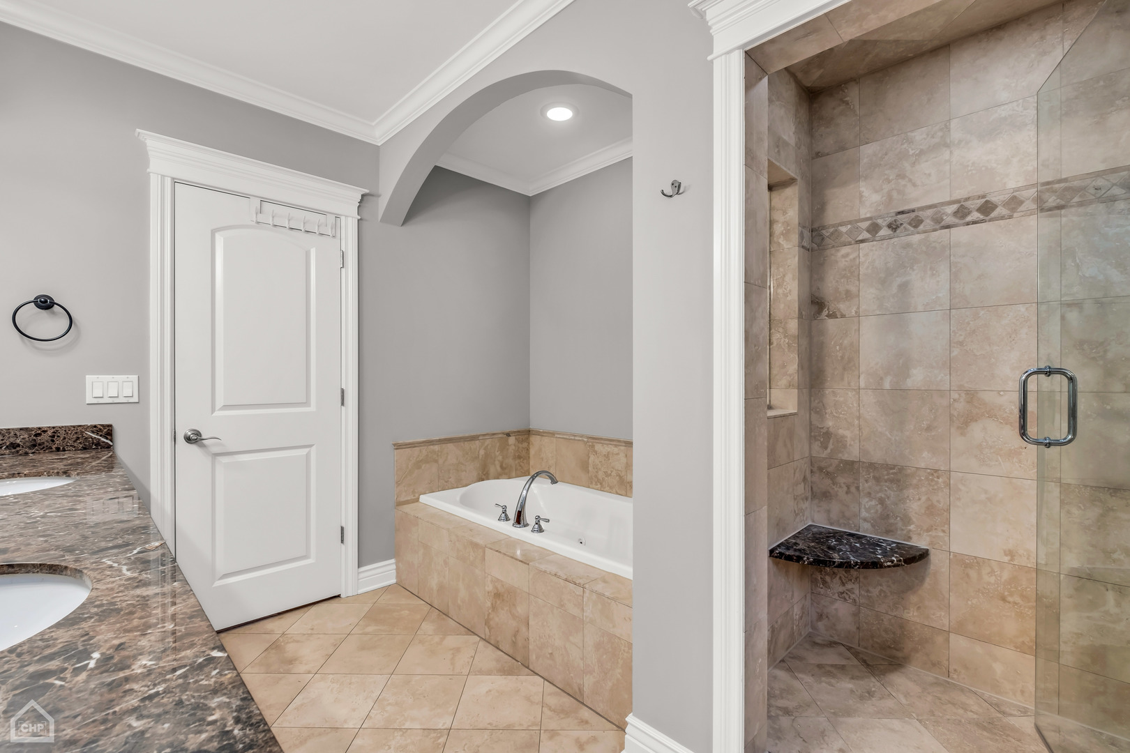 1248 West Jackson Boulevard, Unit 3E Chicago, IL 60607 - Photo 14 of 20 a bathroom with a tub and shower