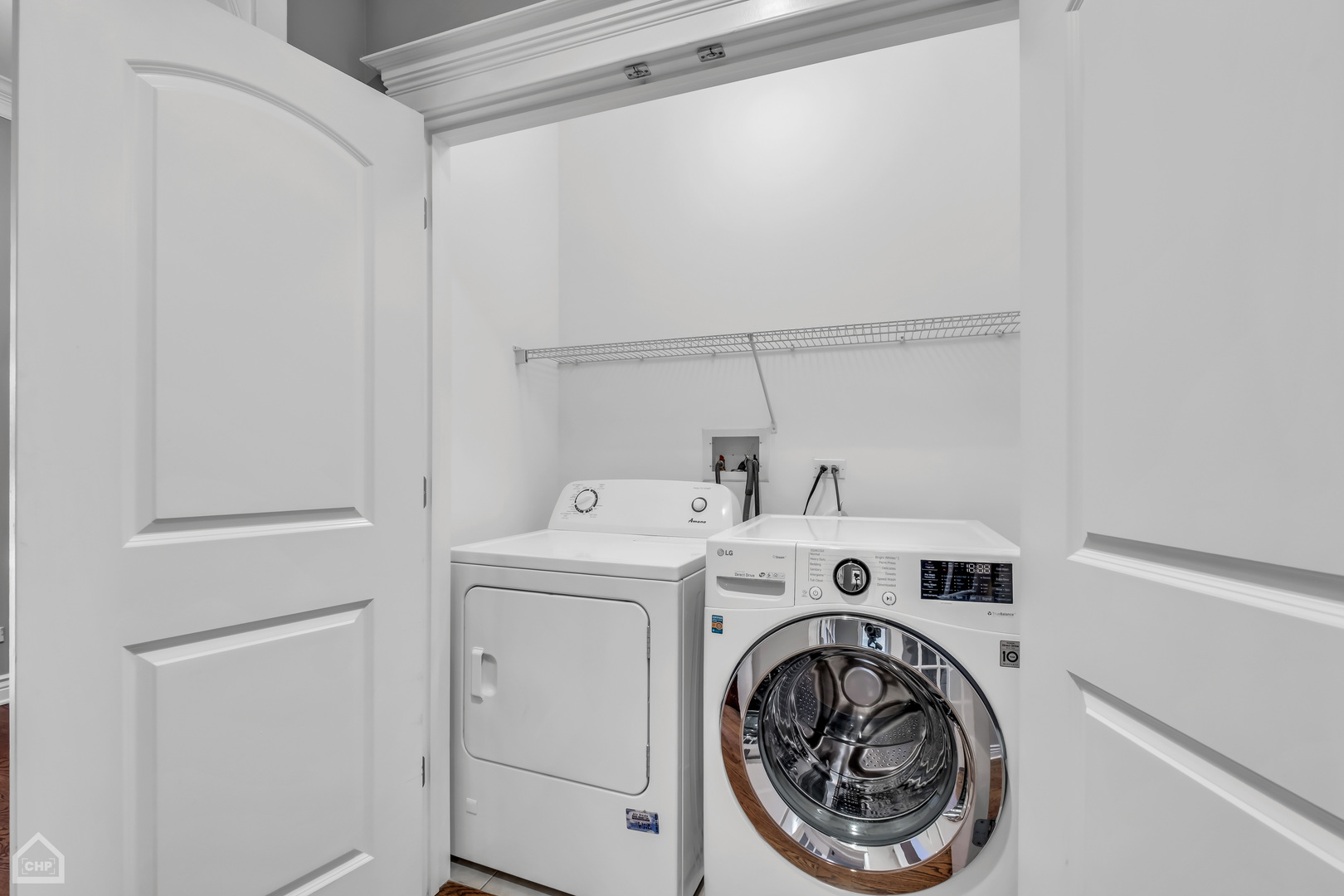 1248 West Jackson Boulevard, Unit 3E Chicago, IL 60607 - Photo 19 of 20 a utility room with dryer and washer