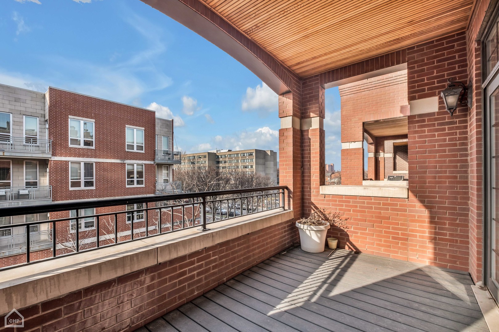 1248 West Jackson Boulevard, Unit 3E Chicago, IL 60607 - Photo 9 of 20 a view of a balcony with city view