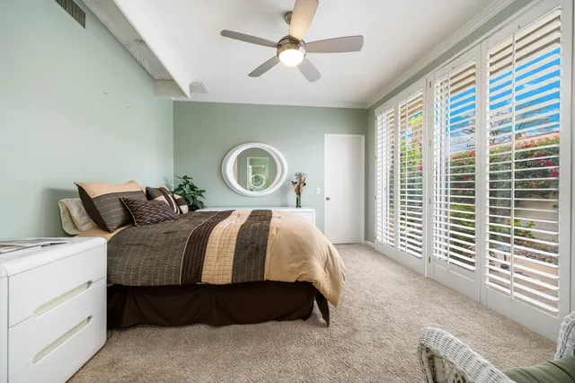 a bathroom with a sink a mirror and a toilet