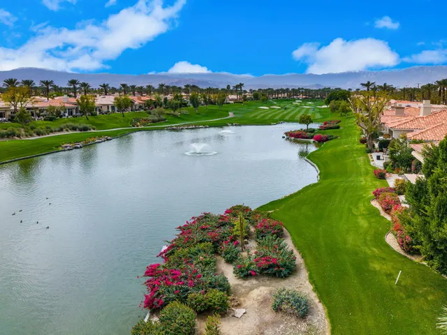 a view of a lake with a city