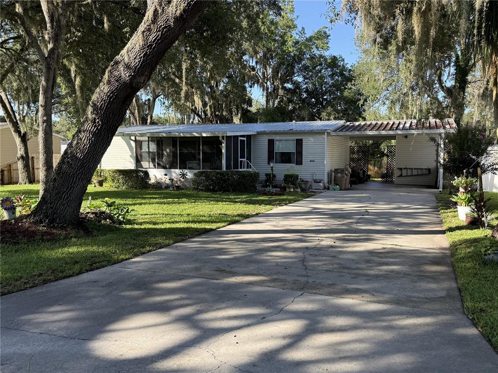 8634 Treasure Island Road Leesburg, FL 34788 - Photo 1 of 17