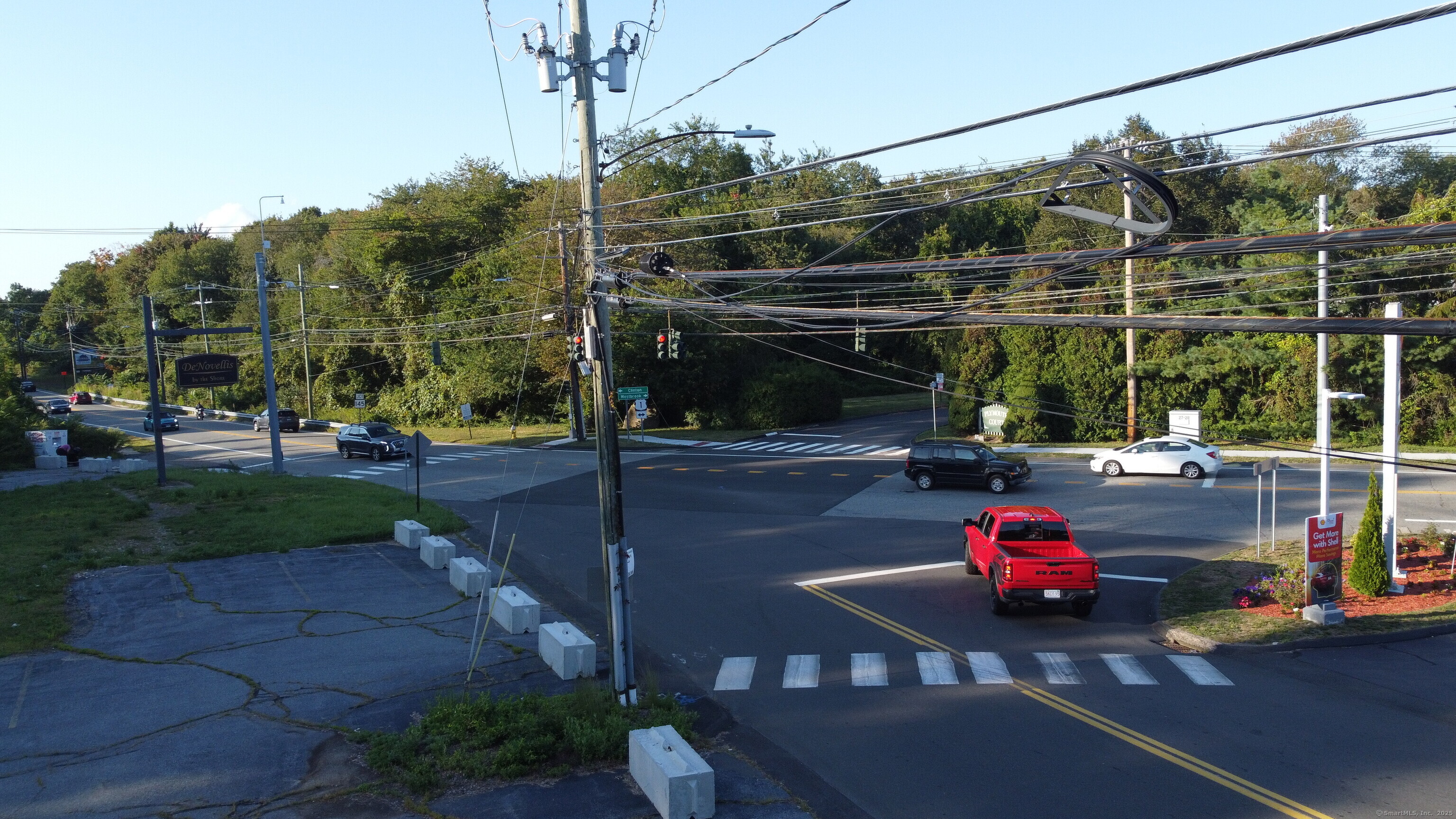 192 East Main Street Clinton, CT 06413 - Photo 2 of 4 a view of a street with cars