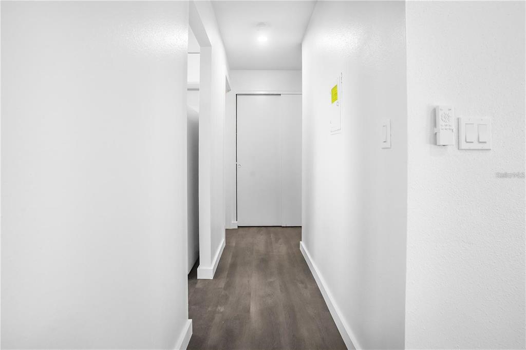 1522 Pleasant Road, Unit G23 Bradenton, FL 34207 - Photo 13 of 27 a view of hallway with wooden floor