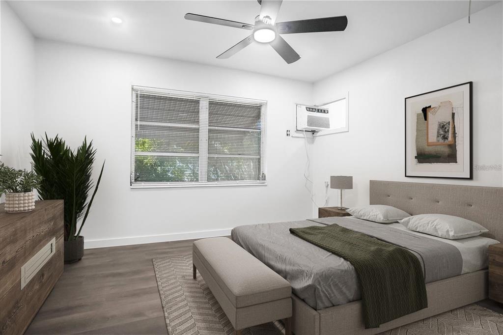 1522 Pleasant Road, Unit G23 Bradenton, FL 34207 - Photo 15 of 27 a bedroom with a bed and a window