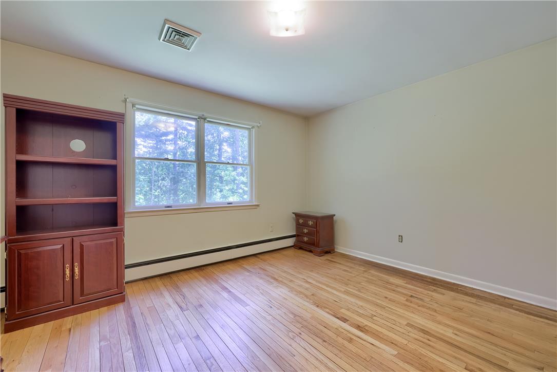 Coldsprings Rd Union Pottstown, PA 19465 - Photo 58 of 71 Hardwood floors and a large window illuminate this inviting, versatile room.