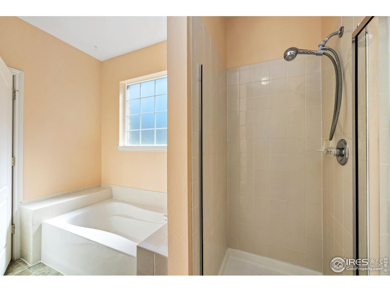 4672 West 20th Road, Unit 2212 Greeley, CO 80634 - Photo 28 of 40 The primary suite is upgraded to a 5-piece full bath and offers a walk in closet.