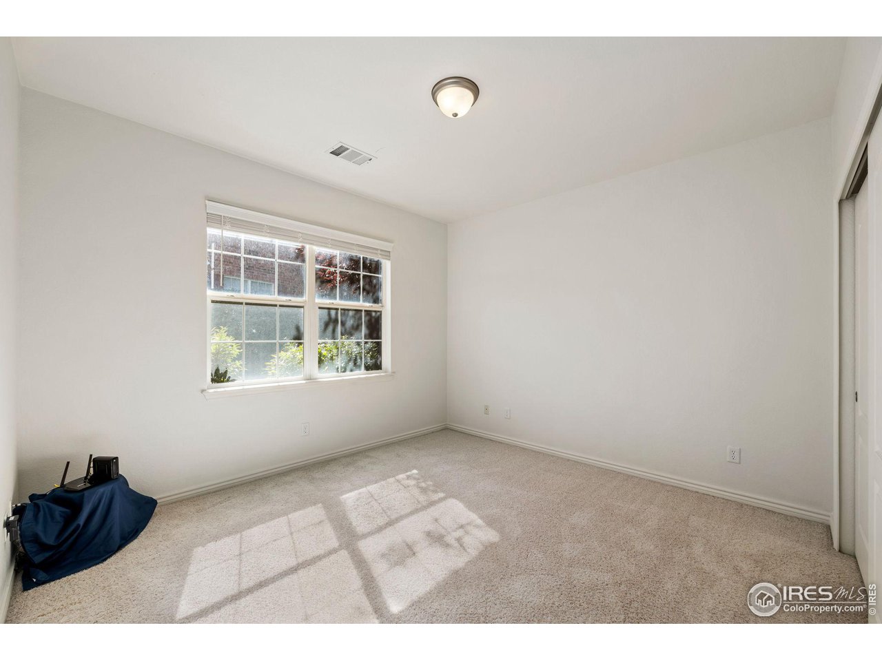 4672 West 20th Road, Unit 2212 Greeley, CO 80634 - Photo 29 of 40 Both bedrooms have private attached full bathrooms. This is the 2nd bedroom.