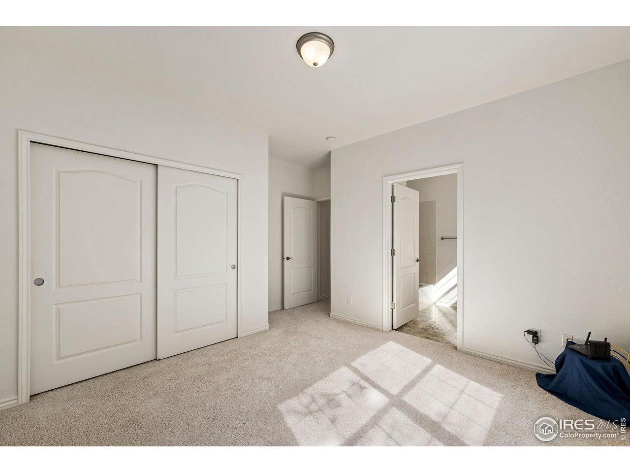 4672 West 20th Road, Unit 2212 Greeley, CO 80634 - Photo 30 of 40 Both bedrooms have private attached full bathrooms. This is the 2nd bedroom.