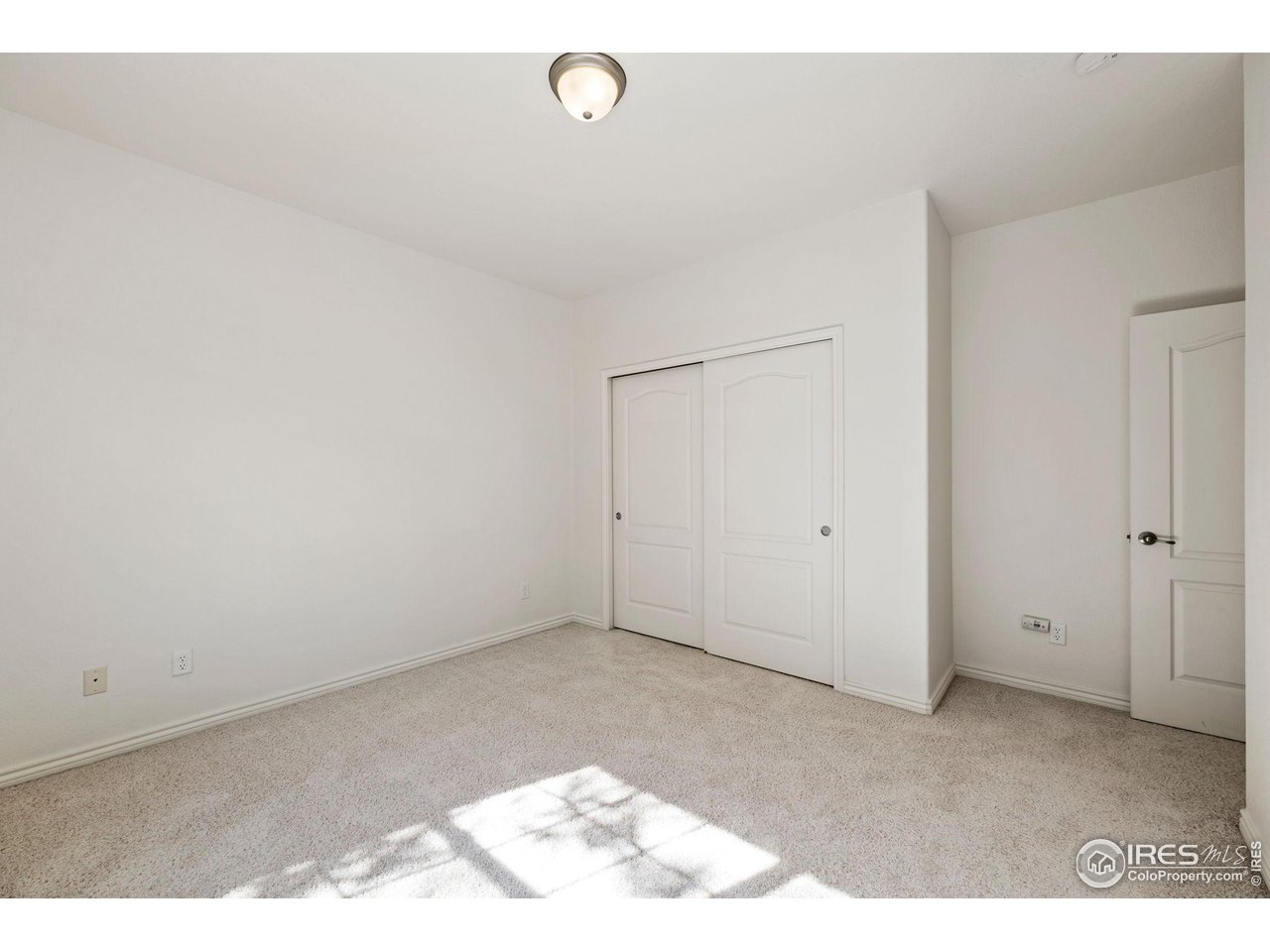 4672 West 20th Road, Unit 2212 Greeley, CO 80634 - Photo 31 of 40 Both bedrooms have private attached full bathrooms. This is the 2nd bedroom.