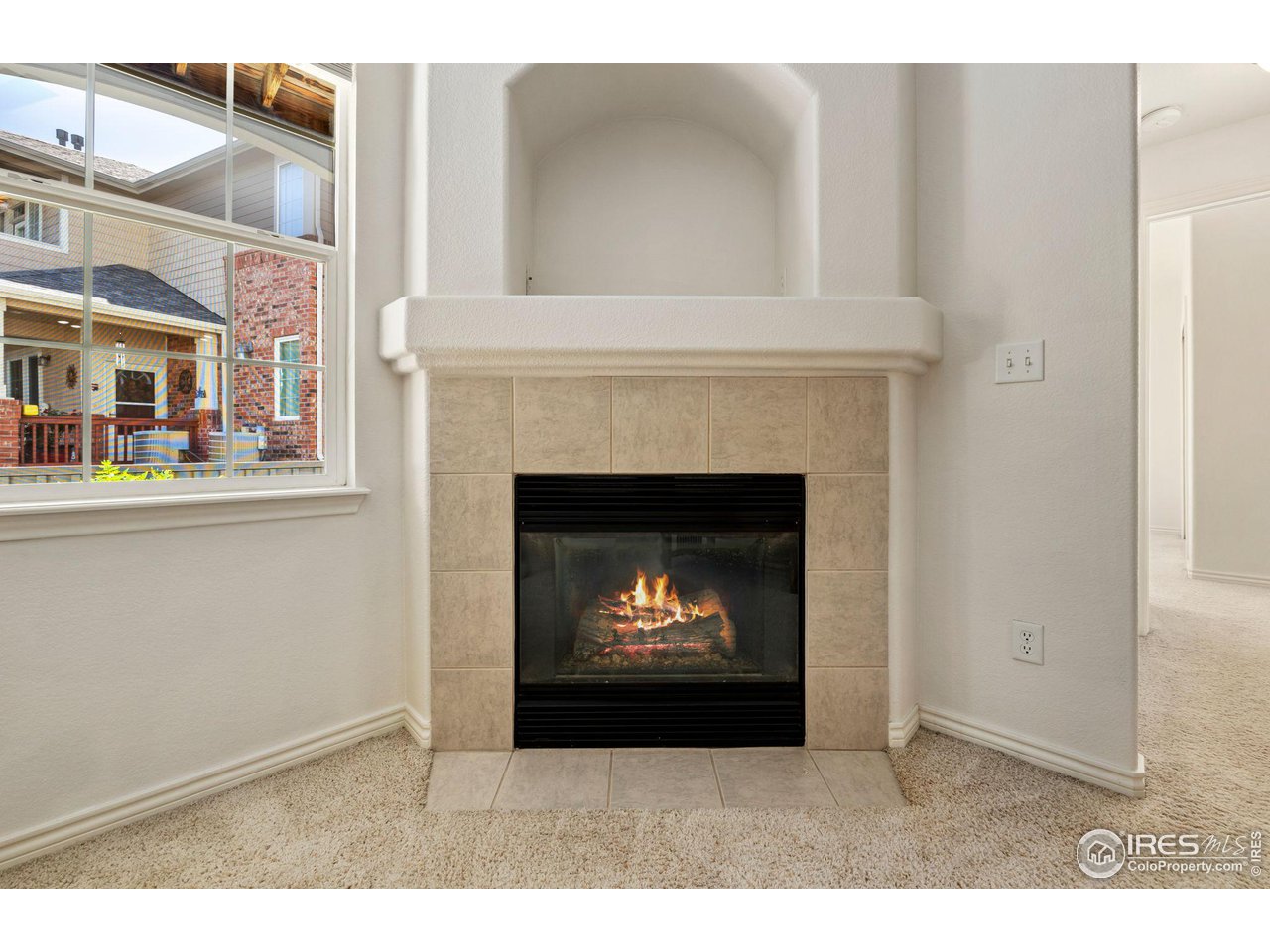 4672 West 20th Road, Unit 2212 Greeley, CO 80634 - Photo 5 of 40 A gas fireplace ensures a welcoming atmosphere.