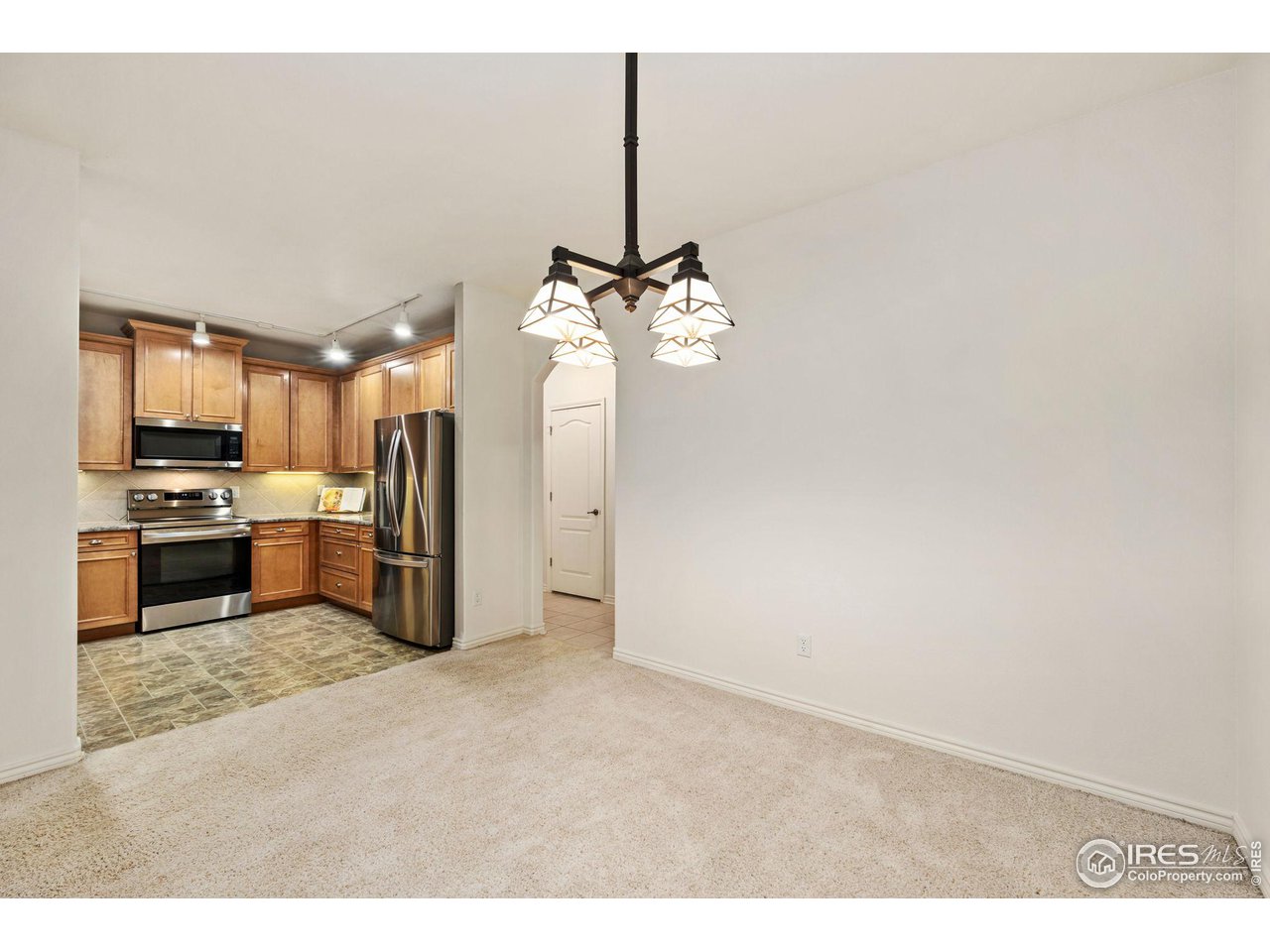 4672 West 20th Road, Unit 2212 Greeley, CO 80634 - Photo 7 of 40 Recent updates include a new HVAC system, new stainless steel appliances including a microwave, dishwasher, oven, and French door refrigerator with LED lighting, as well as new blinds in both bedrooms, the living room, and bathroom.