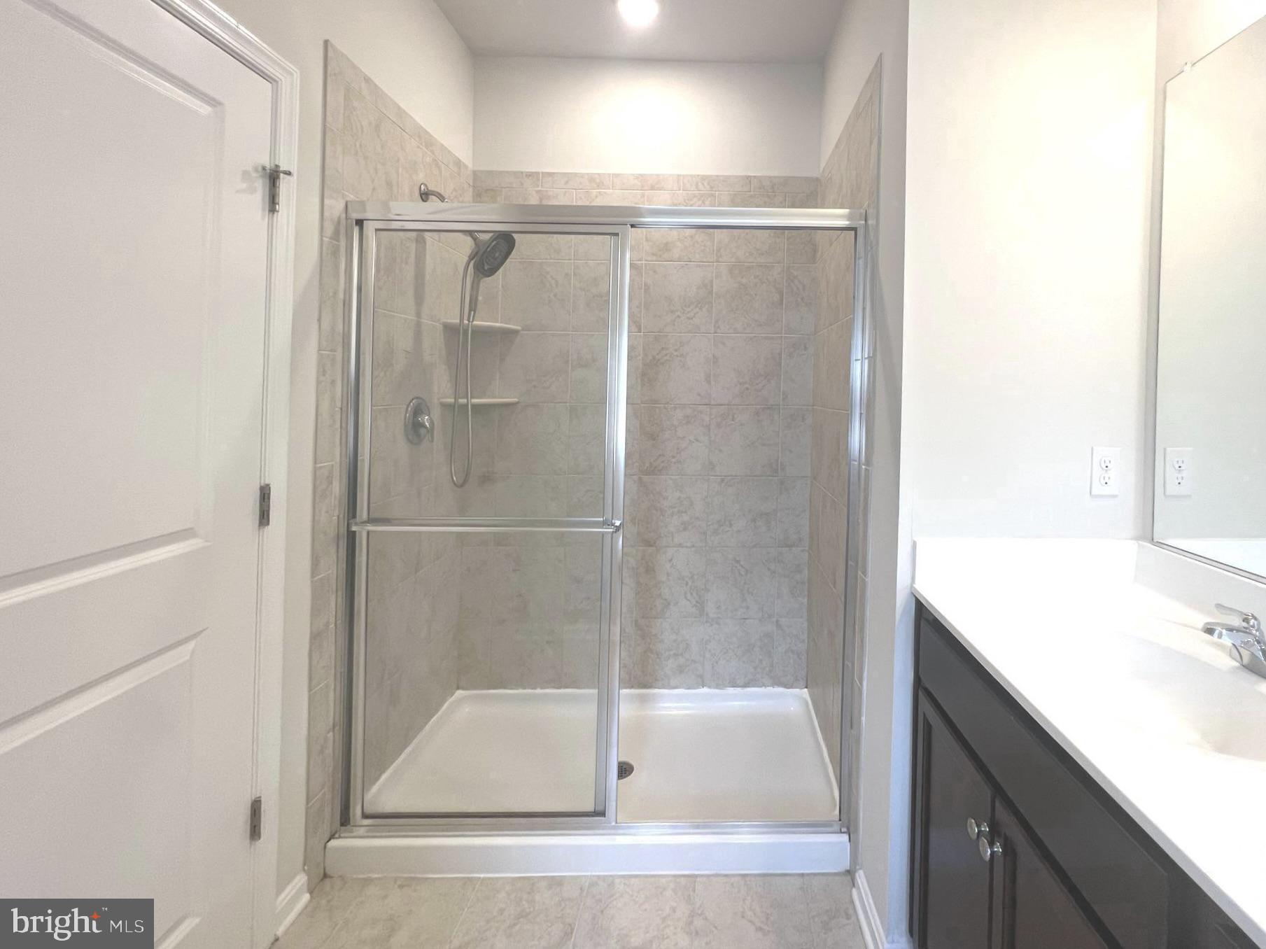 2013 Thornbrook Way Odenton, MD 21113 - Photo 11 of 17 a bathroom with a shower and a tub
