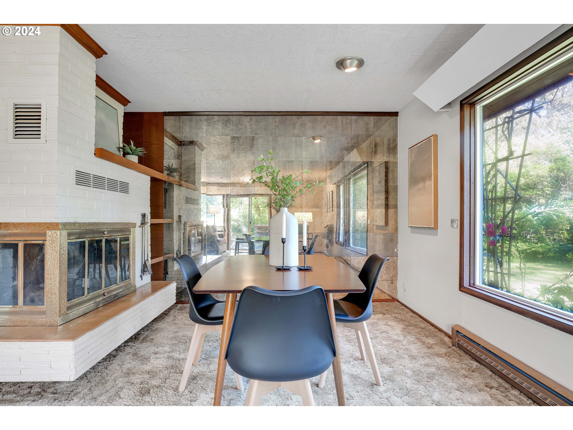 708 Southeast Northway Road Corbett, OR 97019 - Photo 13 of 47 a dining room with furniture a chandelier and wooden floor