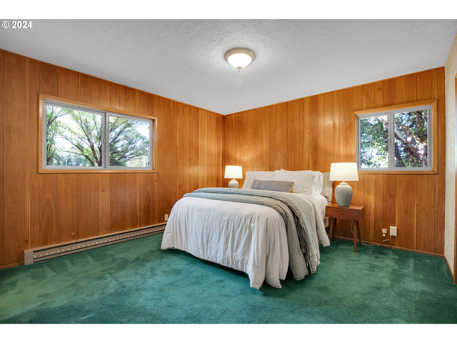 708 Southeast Northway Road Corbett, OR 97019 - Photo 24 of 47 a bedroom with a bed and a window