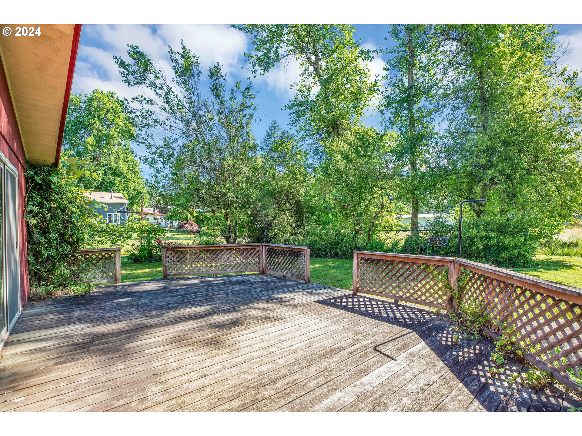 708 Southeast Northway Road Corbett, OR 97019 - Photo 41 of 47 a view of a terrace with trees