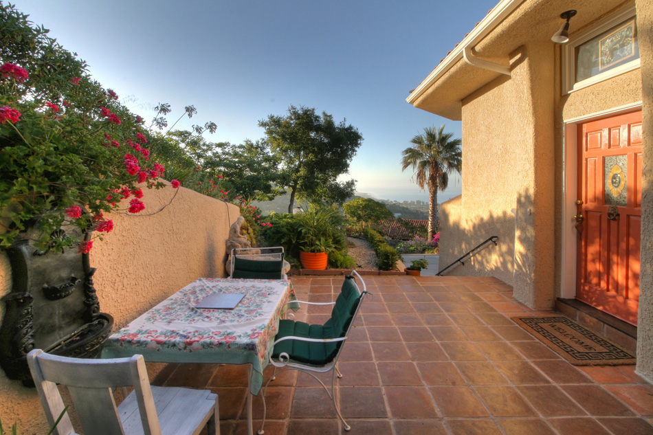 2780 Torito Road Santa Barbara, CA 93108 - Photo 8 of 13 a backyard of a house with table and chairs plants