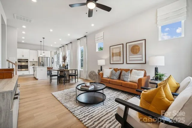 a living room with furniture and a table