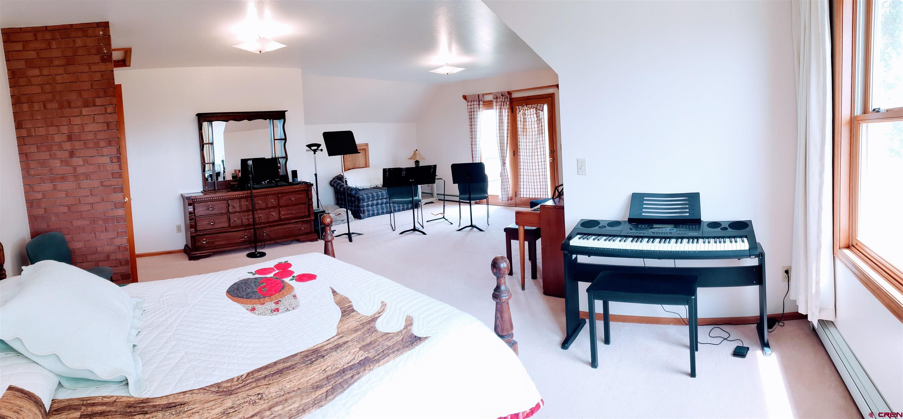 21669 Myers Road Orchard City, CO 81418 - Photo 25 of 35 a living room with furniture and a table
