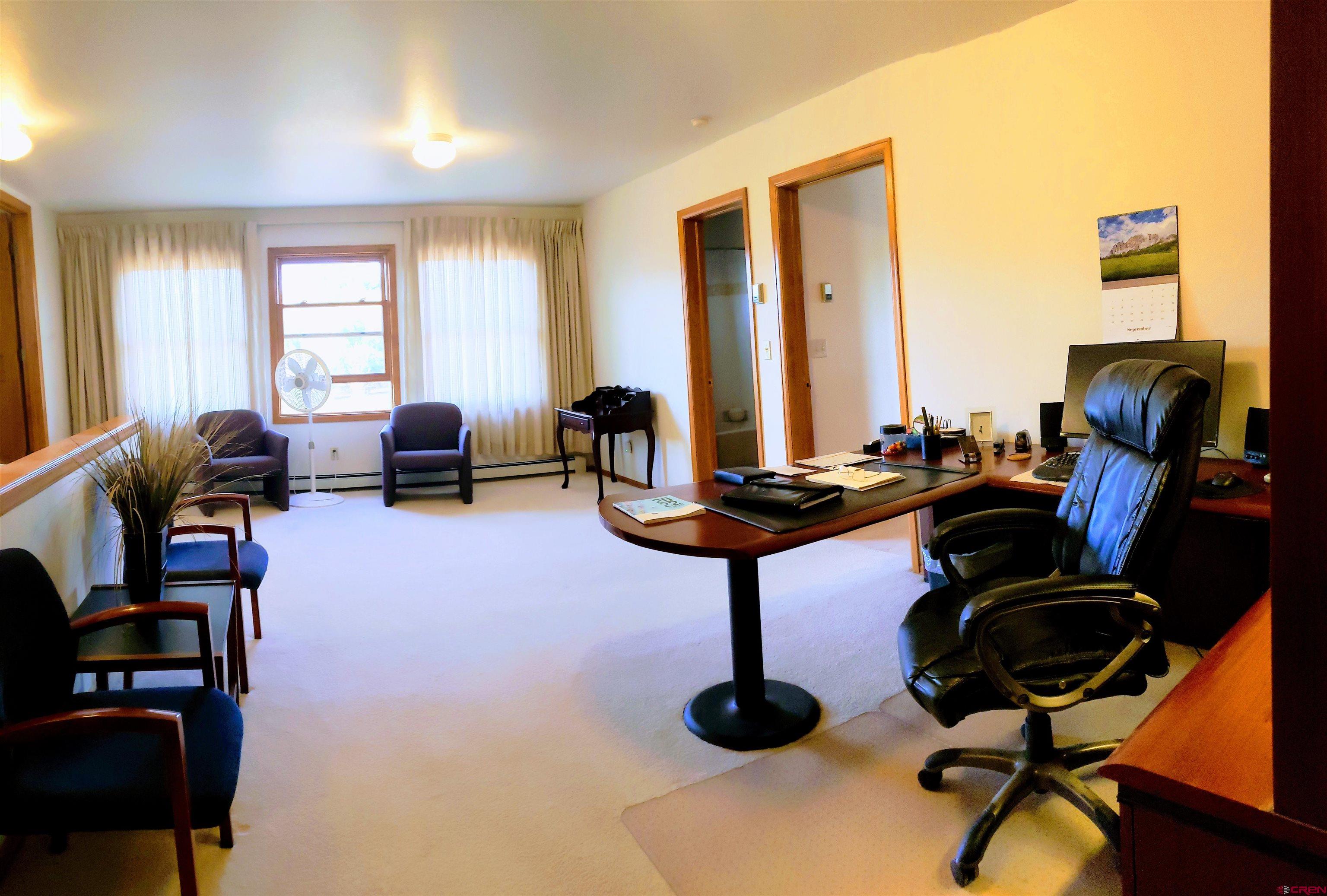 21669 Myers Road Orchard City, CO 81418 - Photo 27 of 35 a room with furniture