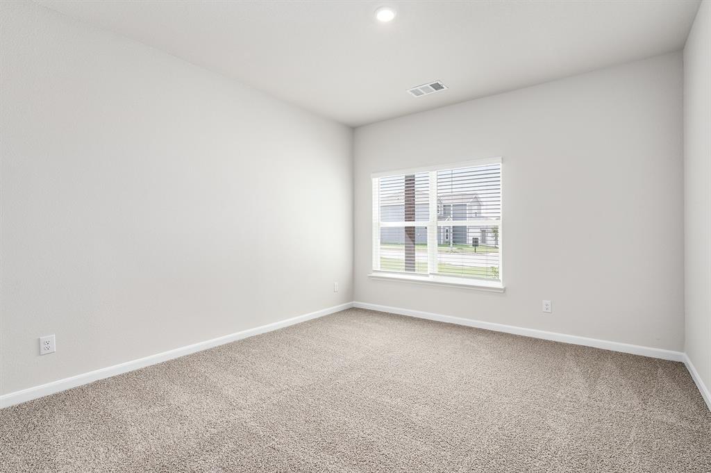 6326 Emerald Tree Lane Dallas, TX 75241 - Photo 13 of 20 an empty room with a window