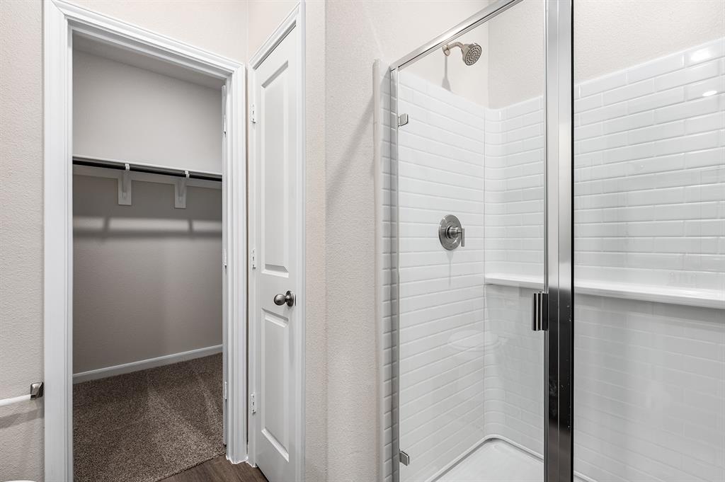 6326 Emerald Tree Lane Dallas, TX 75241 - Photo 16 of 20 a bathroom with a shower
