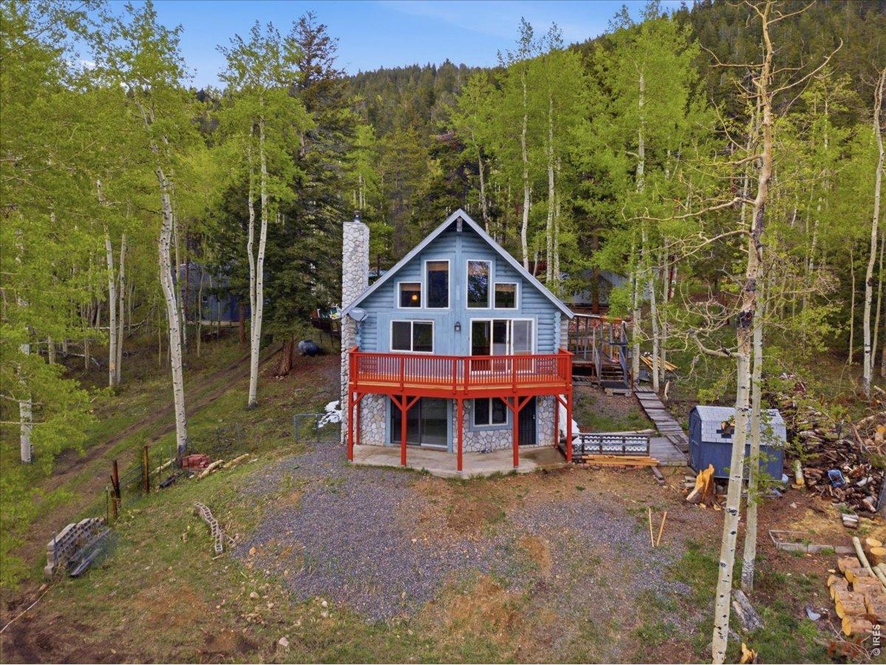 1800 Robinson Hill Road Black Hawk, CO 80422 - Photo 1 of 30 a view of a house with a yard