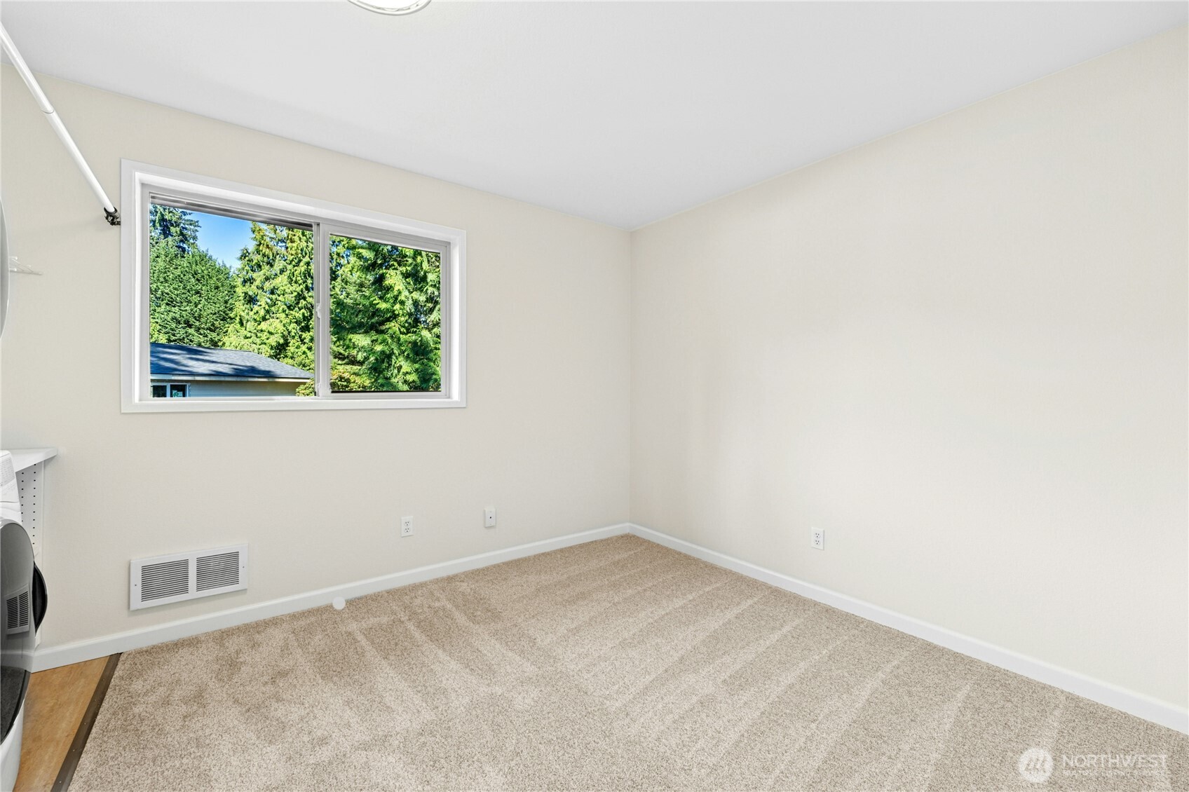 5508 Northeast 10th Street Renton, WA 98059 - Photo 26 of 40 an empty room with a window