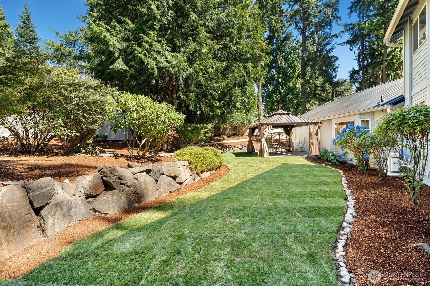 5508 Northeast 10th Street Renton, WA 98059 - Photo 32 of 40 a view of backyard with outdoor space