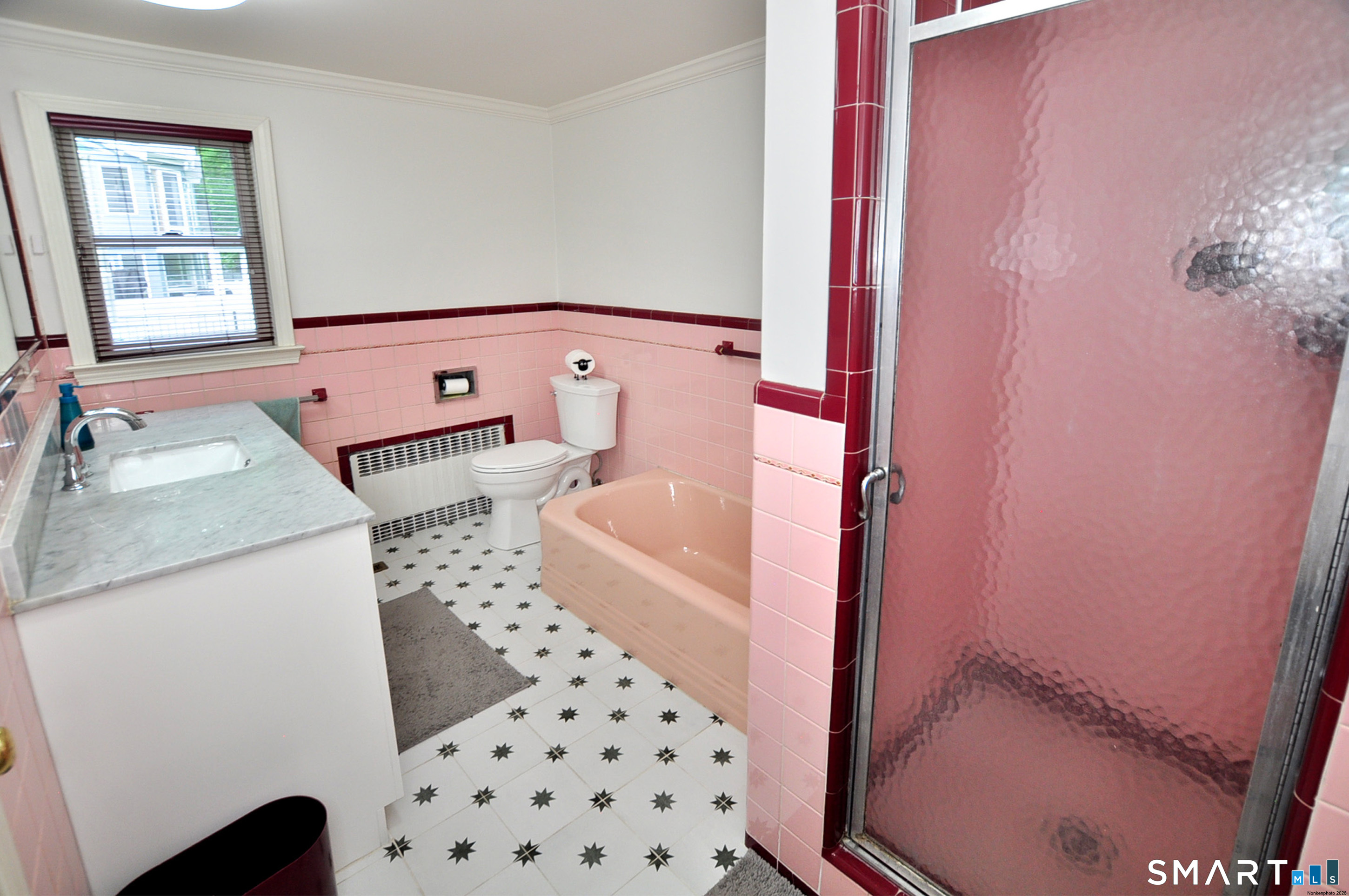 44 Miamis Road West Hartford, CT 06117 - Photo 25 of 39 a bathroom with a sink toilet and shower