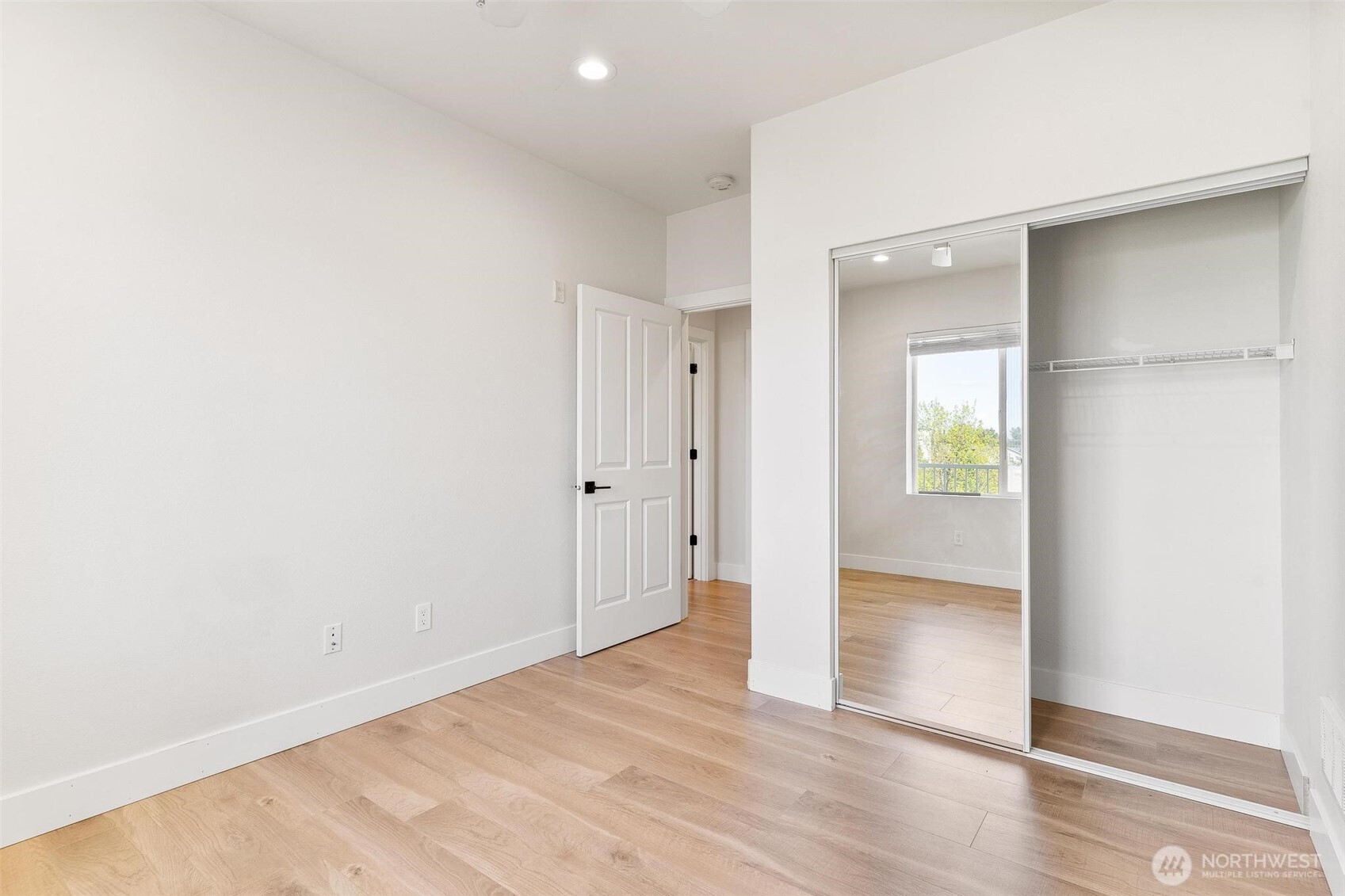 14915 38th Drive Southeast, Unit F3011 Bothell, WA 98012 - Photo 19 of 40 wooden floor in an empty room