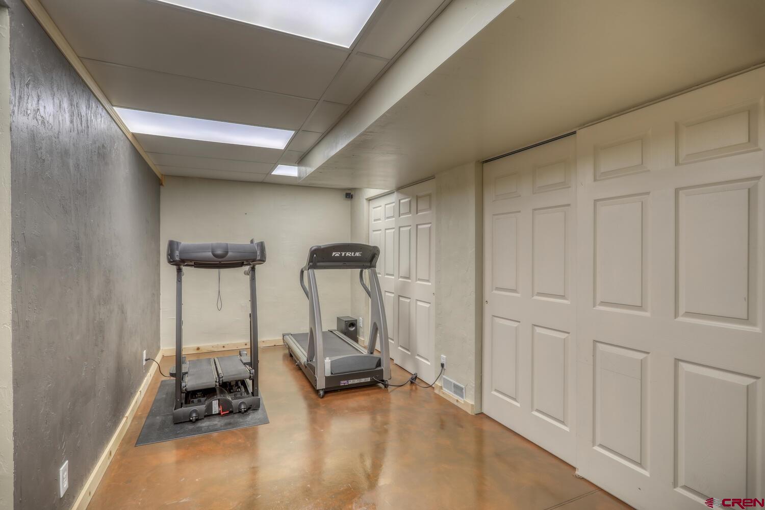 569 Eight Mile Loop Pagosa Springs, CO 81147 - Photo 28 of 31 a view of a room with gym equipment