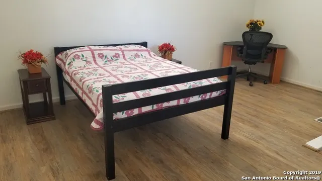 a bathroom with a sink and a window