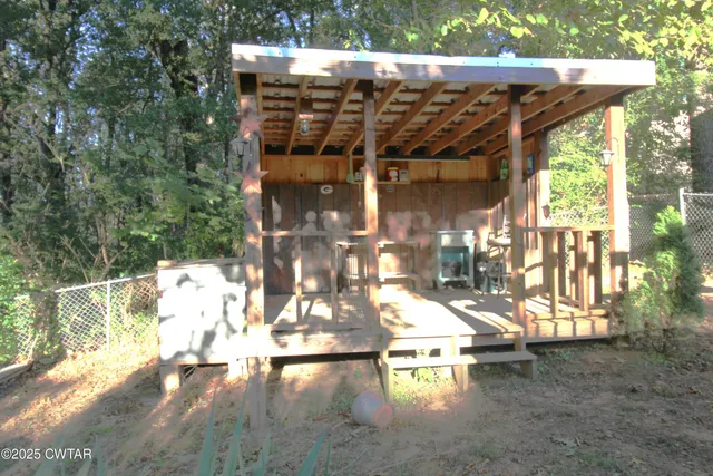 a view of swimming pool with outdoor seating